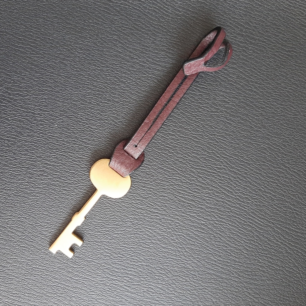 Fossil key bag charm